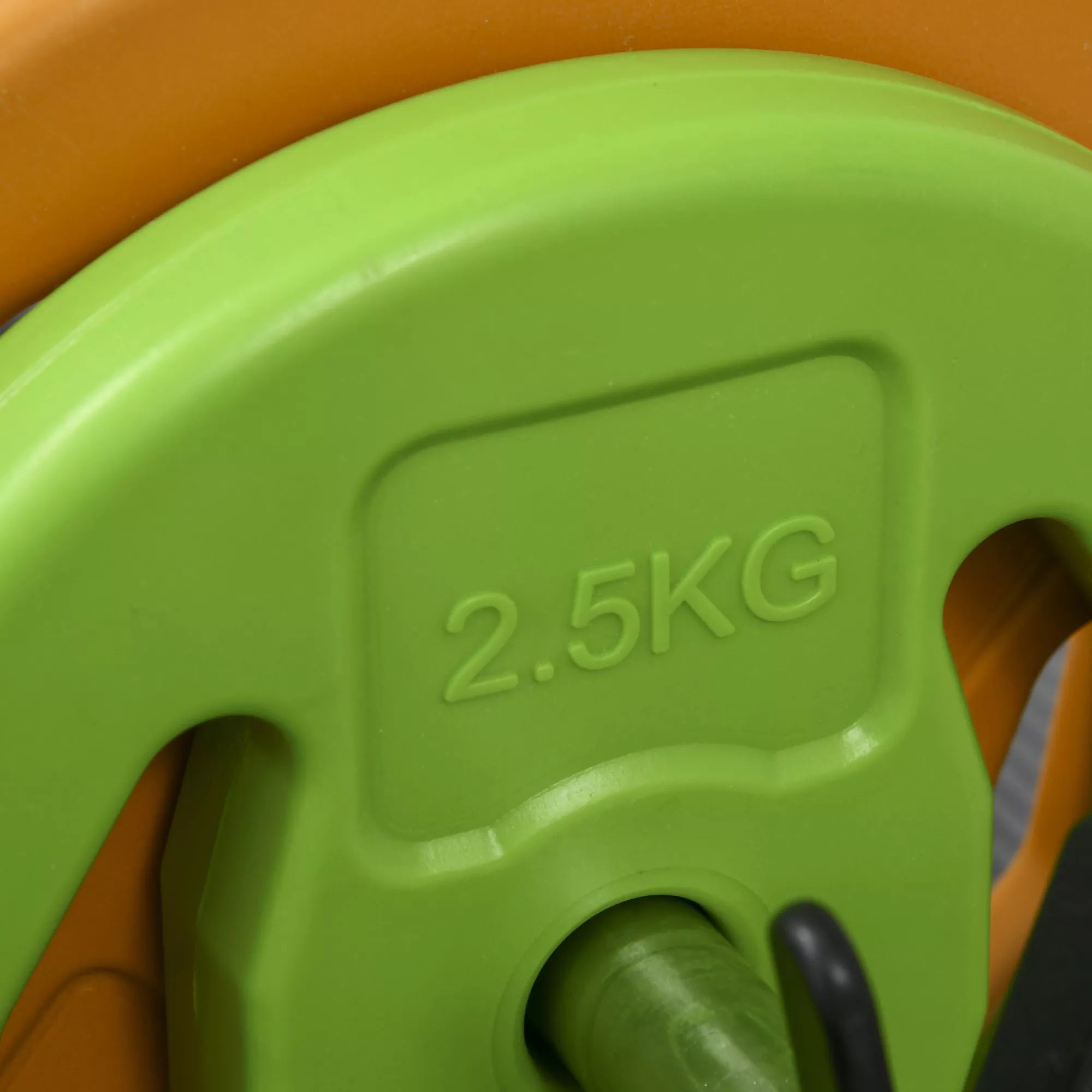 Žalias 2,5 kg svorio diskas iš arti