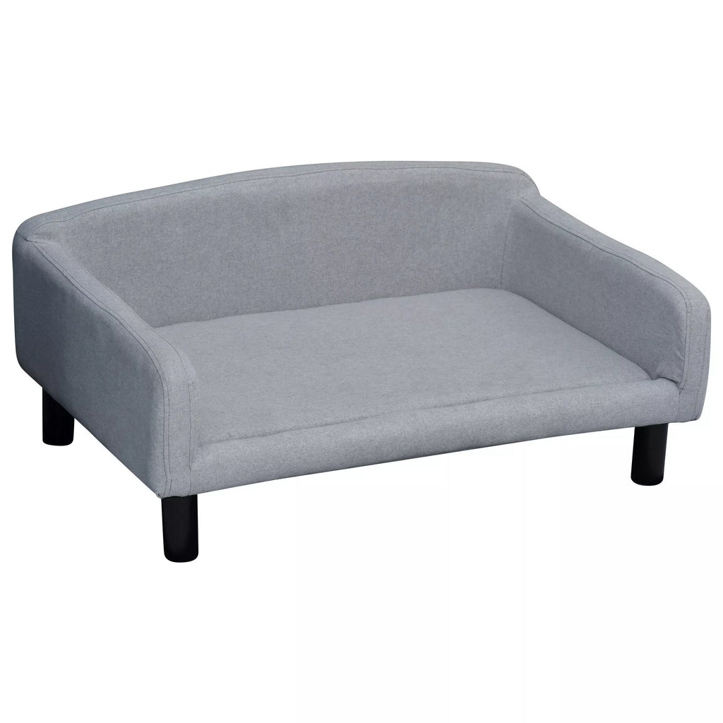 Šviesiai pilka aksominė šunų sofa su atlošu ir medinėmis kojelėmis