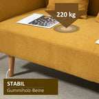 Geltona sofa su kaučiukmedžio kojomis