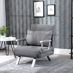 Svetainės kampe pilka sofa-lova fotelis prie staliuko
