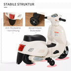 Iš arti matomi motorolerio stabilizavimo ratukai ir žibintas
