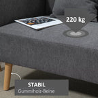 Pilka sofa su kaučiukmedžio kojomis