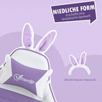 Infografika: nuimamos triušio ausys ant violetinės kėdės galvos atrama