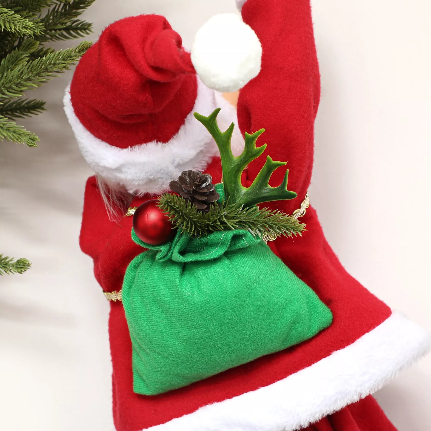 HOMCOM 60 cm dainuojantis ir lipantis Kalėdų senis su dovanų virve ir garso funkcija, raudonas, skirtas naudoti patalpose