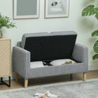 Šviesiai pilka sofa su pakelta sėdyne ir daiktadėže