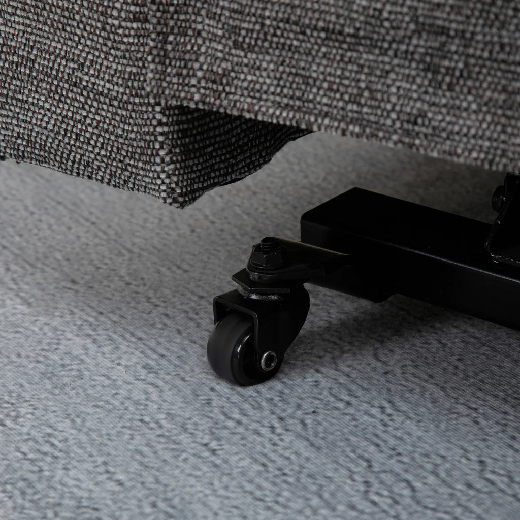 Fotelio pagrindo ratuko ir pakėlimo mechanizmo detalė iš arti