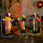 Helovino dekoracija – sukraunami animatroniniai klounai, raudonai švytinčiomis akimis