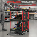 Vyras stumia įrankiais pakrautą vežimėlį dirbtuvės patalpoje