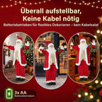 Koliažas su Kalėdų Seneliu skirtingose patalpose, veikiančiu baterijomis