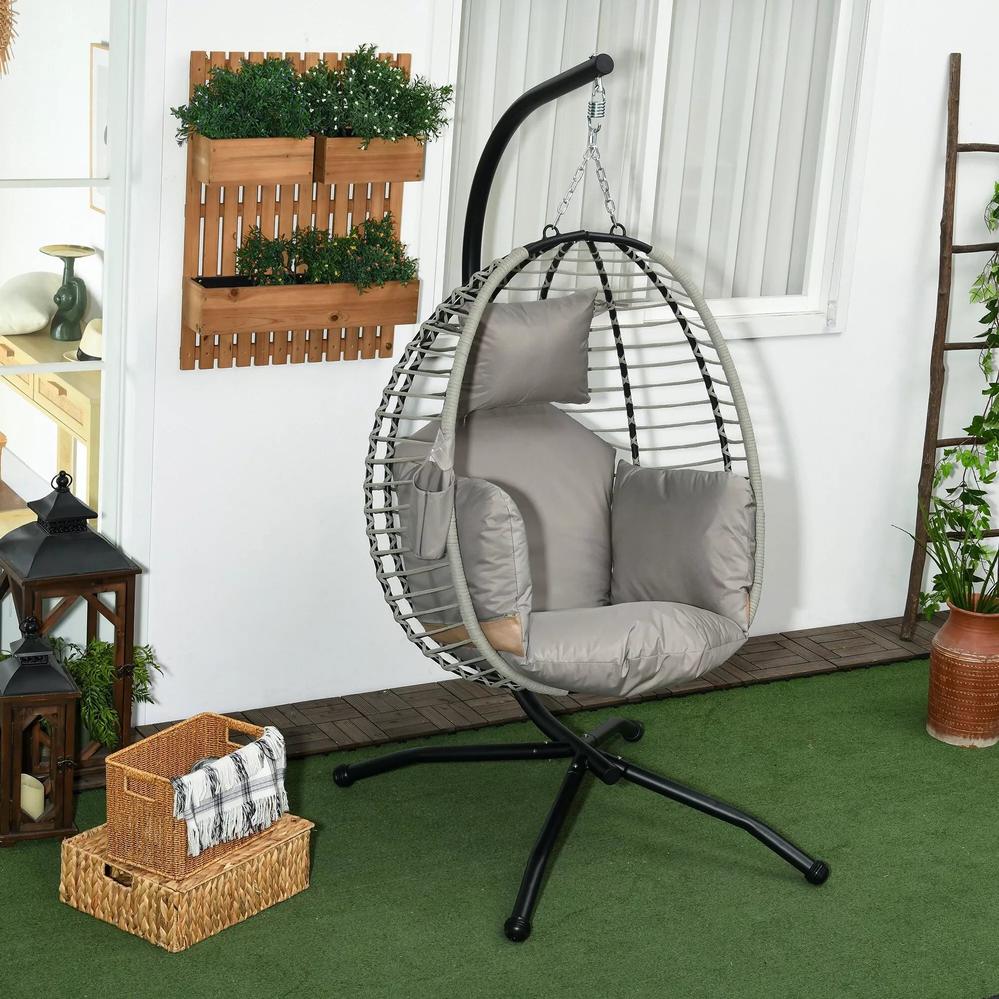 Kėdė-sūpynės, sėdimosios ir atlošo pagalvėlės, sulankstomas sėdimojo krepšio rėmas, puodelių laikiklis, metalinis rėmas, pilkos spalvos