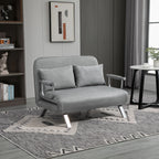 Šviesiai pilka sofa-lova modernaus interjero kambaryje su knygų lentyna