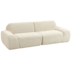 Suapvalintų formų kreminė sofa su dviem sėdimosiomis dalimis