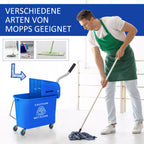 Žalia prijuoste vilkintis vyras plauna grindis plokščia šluoste