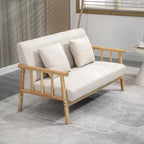 Smėlio dvivietė sofa su pagalvėlėmis interjere