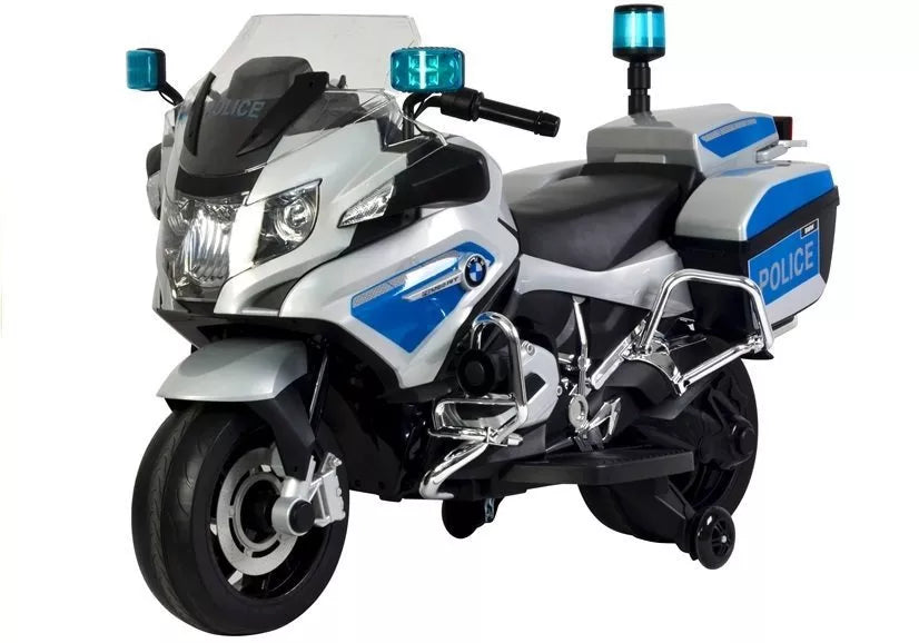 Vaikiškas policijos stiliaus motociklas iš priekio dešiniuoju šonu