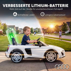 Saulėlydžio fone vaikas vairuoja baltą elektromobilį kieme