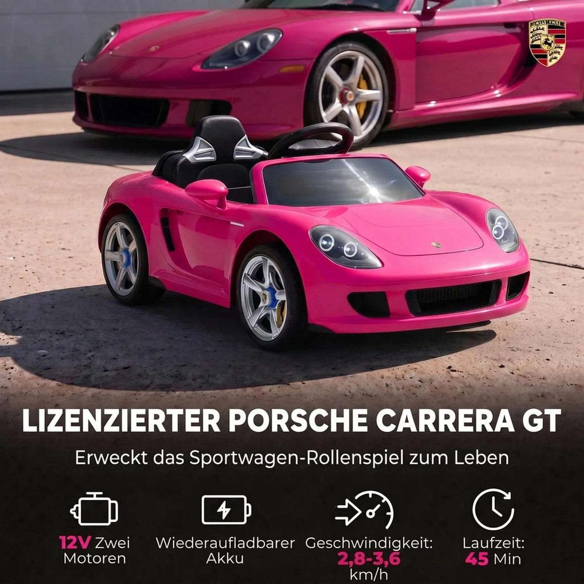 Rožinis Porsche elektromobilis šalia tikro sportinio automobilio fono