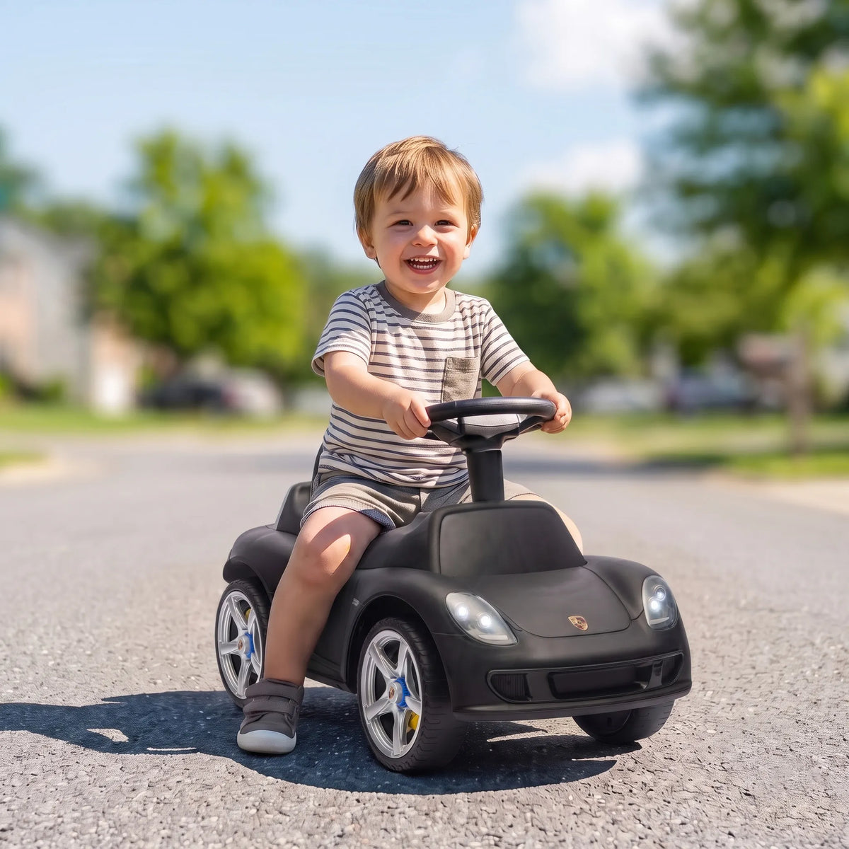 Vaikiškas stumdukas „Porsche“ su garso signalu ir žibintais, 18–36 mėn., matinis juodas