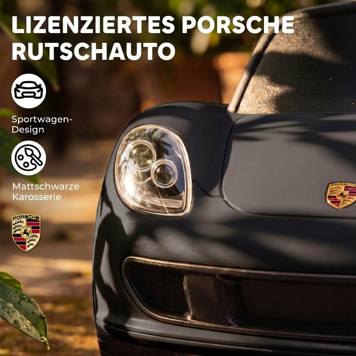Priekinis žibintas ir Porsche ženkliukas ant matinio juodo kėbulo artimu planu