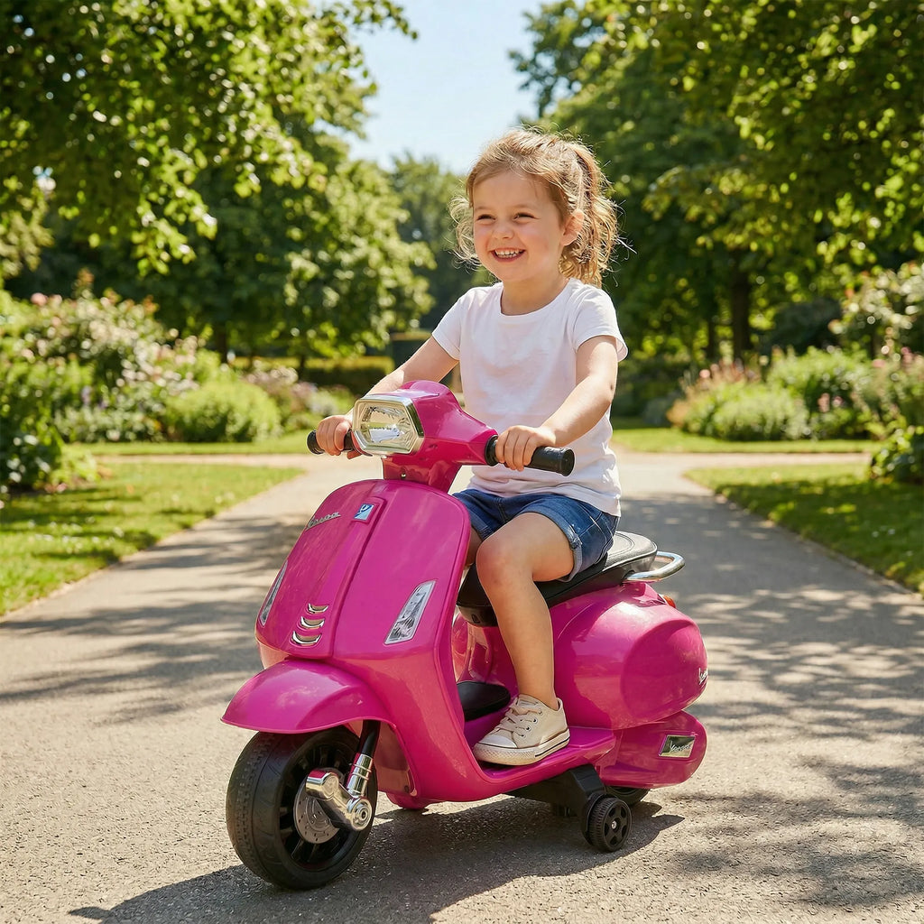 Vespa elektrinis motociklas vaikams su pagalbiniais ratukais rožinis